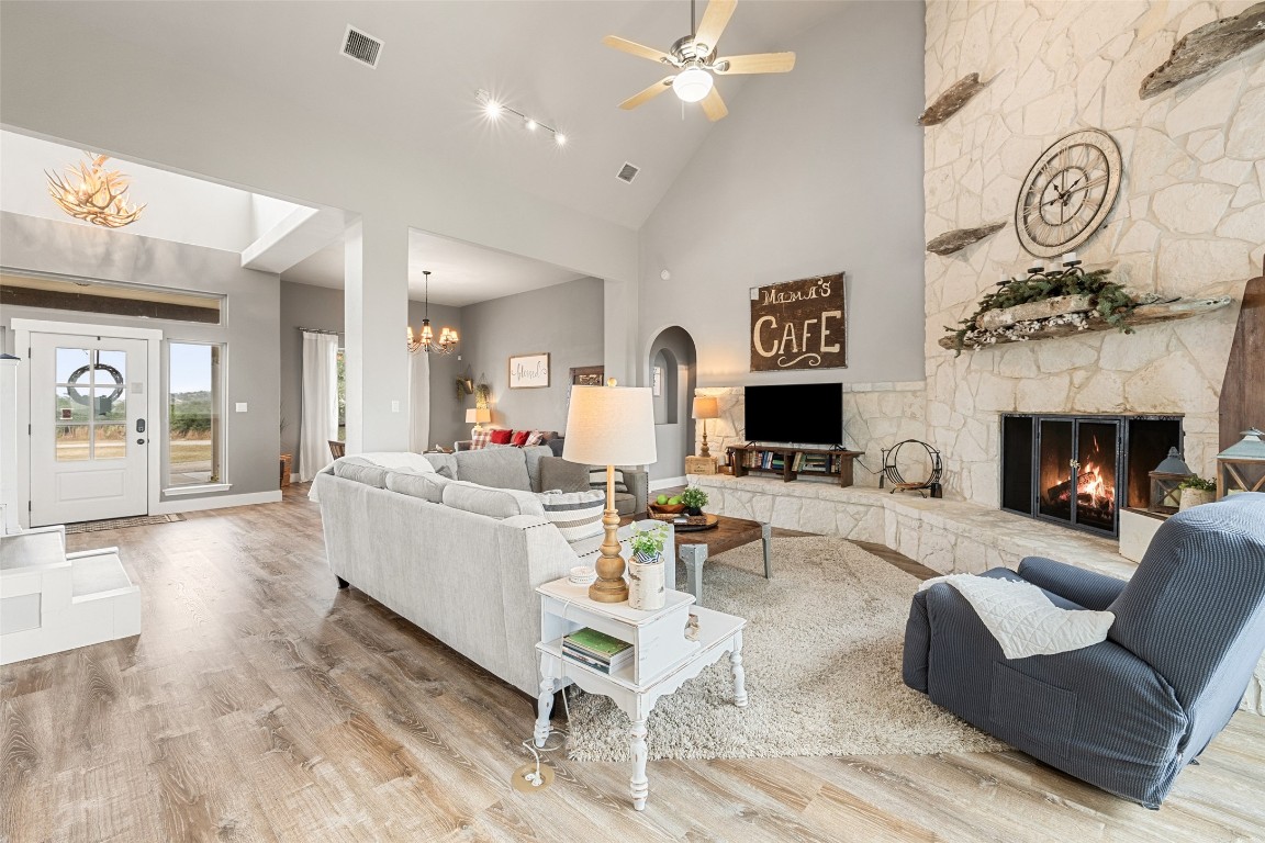 3108 Rolling Hills Road Blanco, TX 78606 - Photo 7 of 39 a living room with furniture and a fireplace