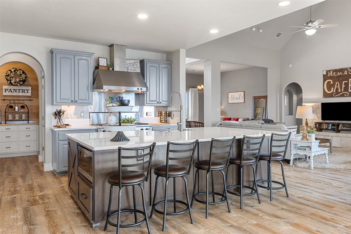 3108 Rolling Hills Road Blanco, TX 78606 - Photo 9 of 39 a view of kitchen with cabinets and wooden floor