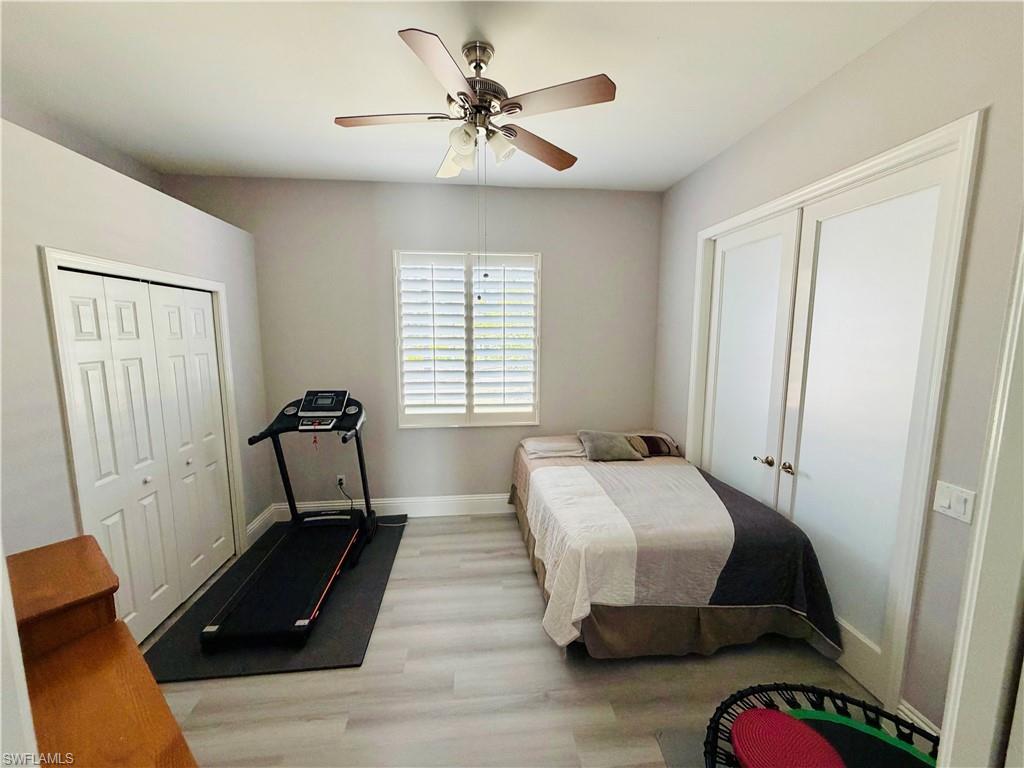 3960 1st Avenue Northwest Naples, FL 34119 - Photo 17 of 25 a bedroom with bed and window