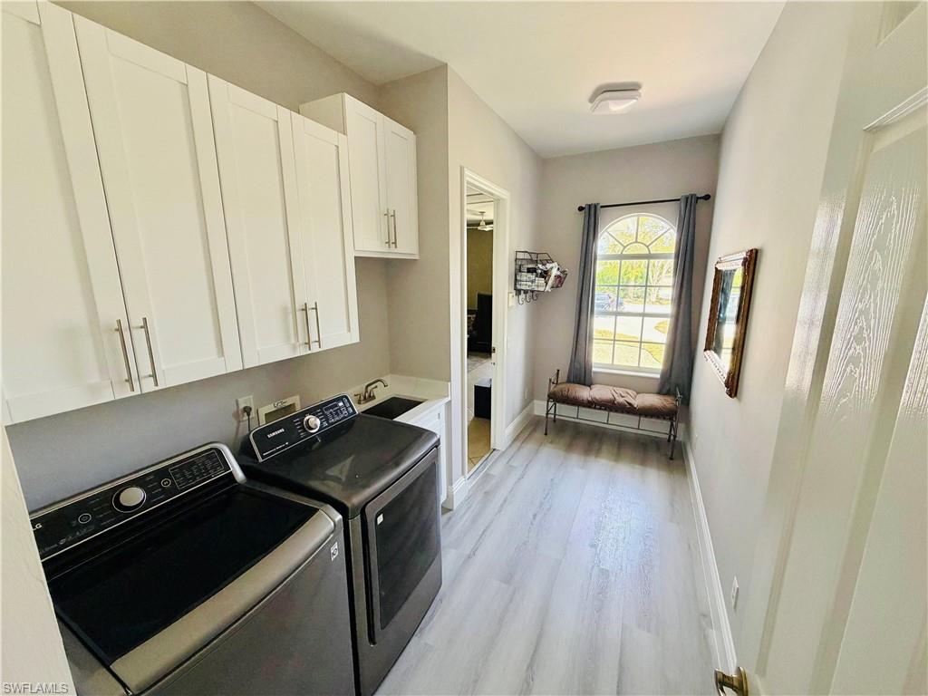 3960 1st Avenue Northwest Naples, FL 34119 - Photo 22 of 25 a kitchen with sink and cabinets
