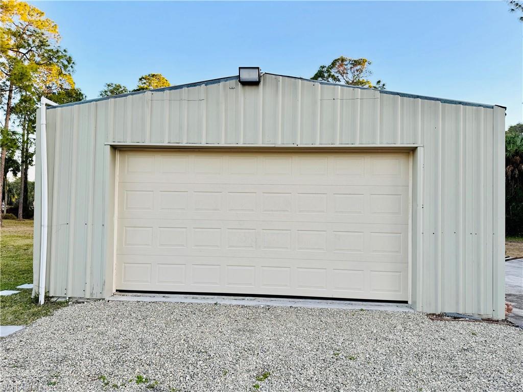 3960 1st Avenue Northwest Naples, FL 34119 - Photo 25 of 25 a view of a small wooden fence