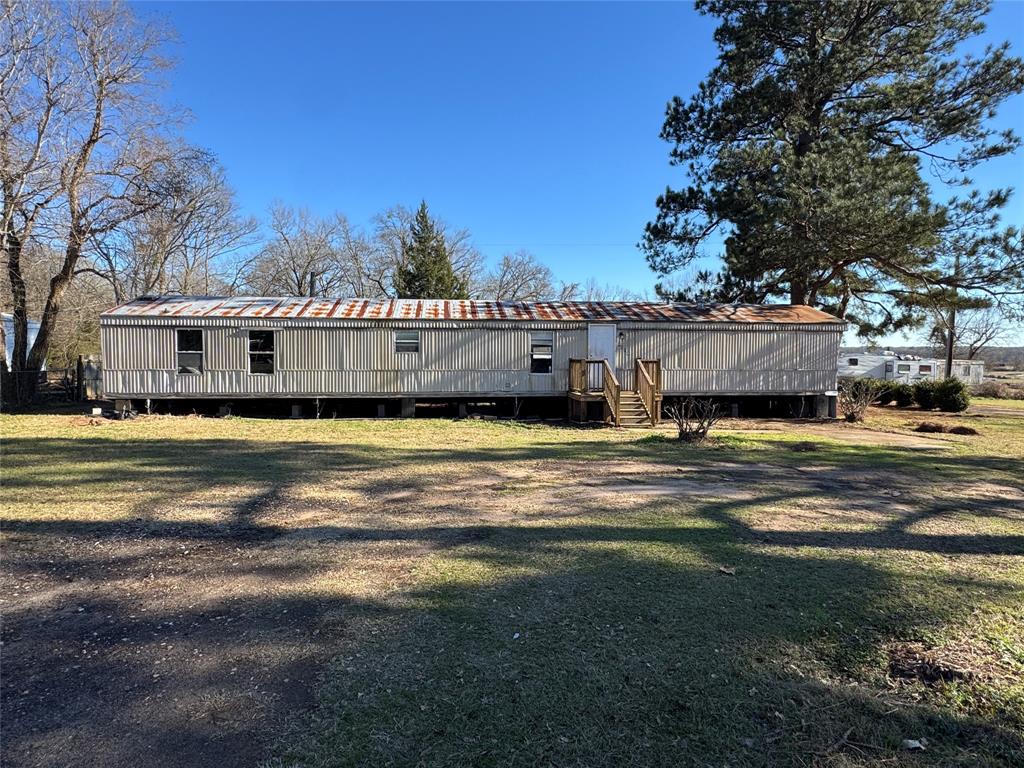 8685 Dixie Blanchard Road Shreveport, LA 71107 - Photo 1 of 1 a view of a house with a big yard