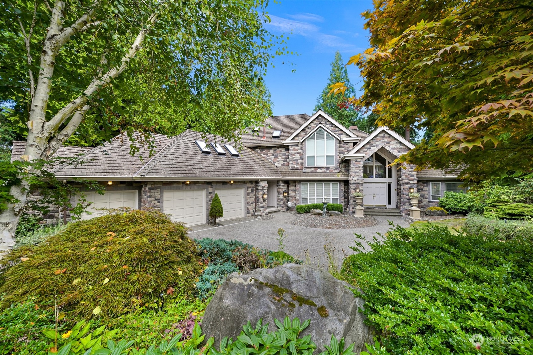 5423 Canvasback Road Blaine, WA 98230 - Photo 1 of 40 a front view of a house with yard and green space