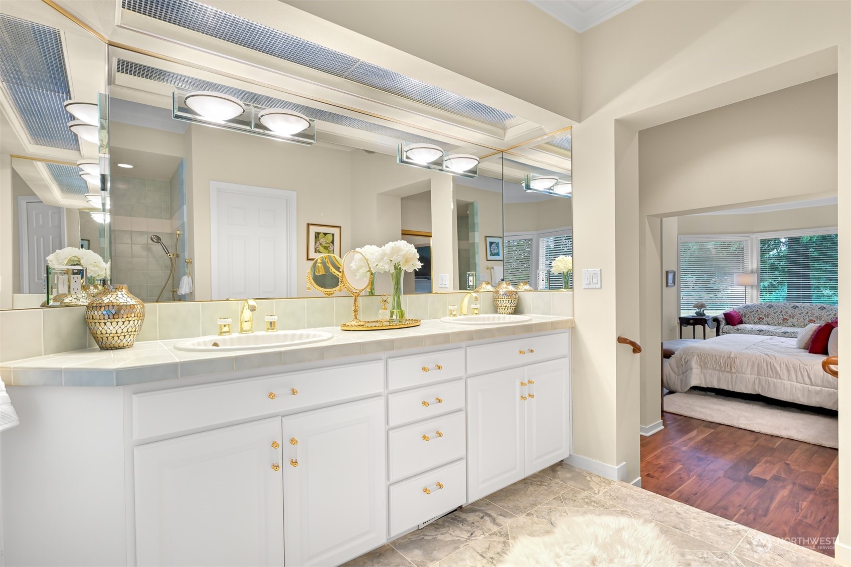 5423 Canvasback Road Blaine, WA 98230 - Photo 24 of 40 a spacious bathroom with a double vanity sink and a mirror
