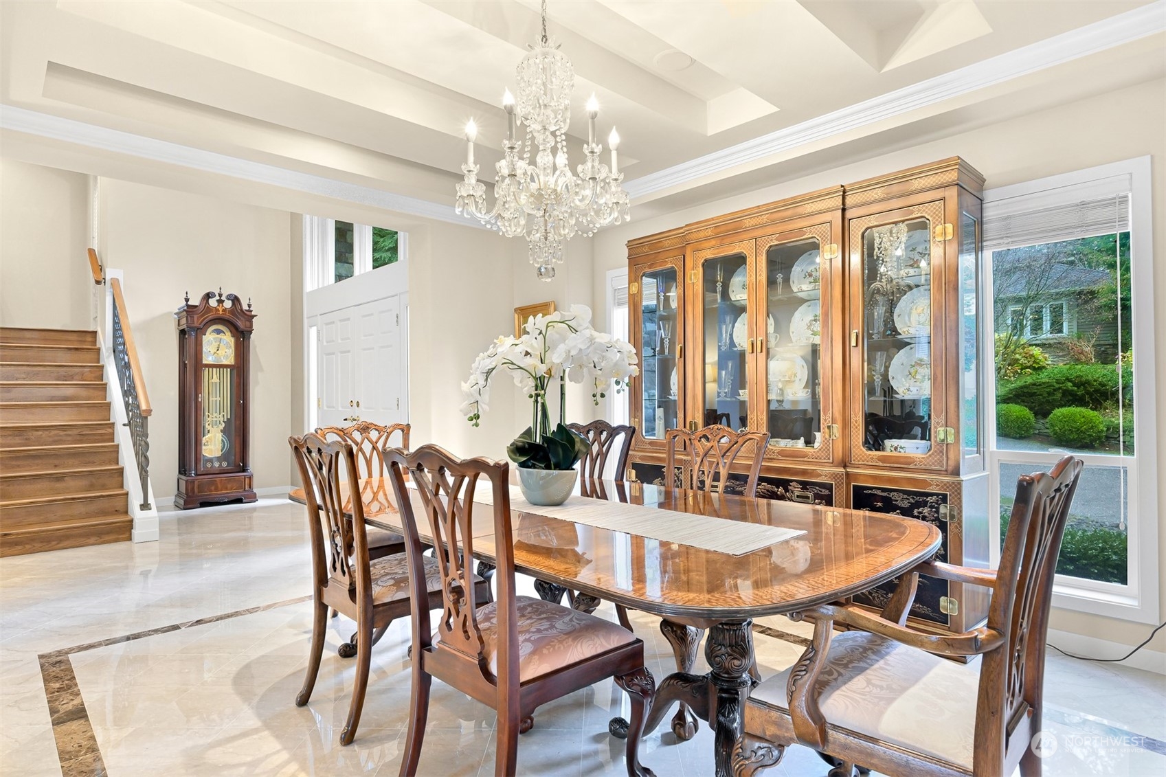 5423 Canvasback Road Blaine, WA 98230 - Photo 4 of 40 a view of a dining room with furniture a chandelier and wooden floor
