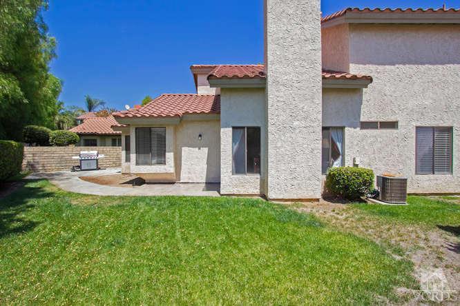 2711 Simi Hills Lane Simi Valley, CA 93063 - Photo 14 of 20 a view of a house with a yard and sitting area