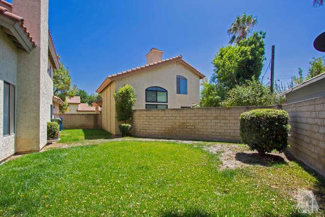2711 Simi Hills Lane Simi Valley, CA 93063 - Photo 16 of 20 a view of a house with a yard and a garden