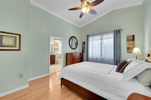 a bed room with a bed and a lamp