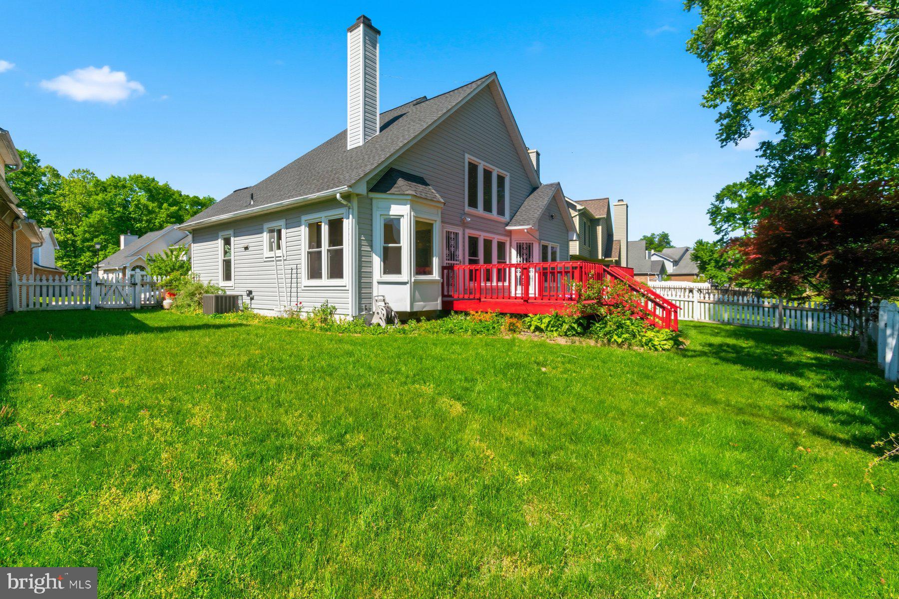 14215 Greenview Drive Laurel, MD 20708 - Photo 32 of 35 a front view of house with yard and green space