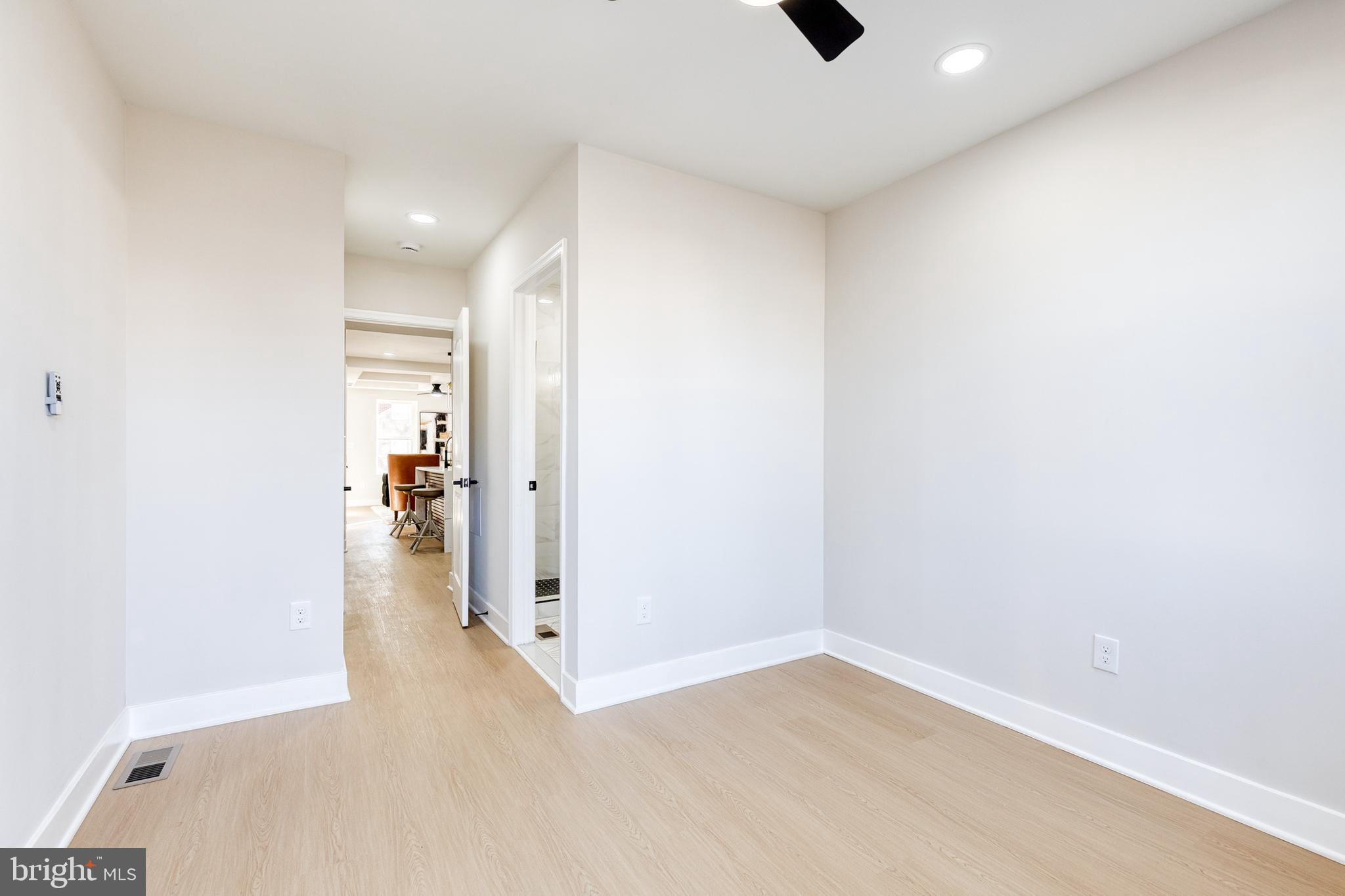 3716 Beehler Avenue Baltimore, MD 21215 - Photo 21 of 38 Main level bedroom with attached bath