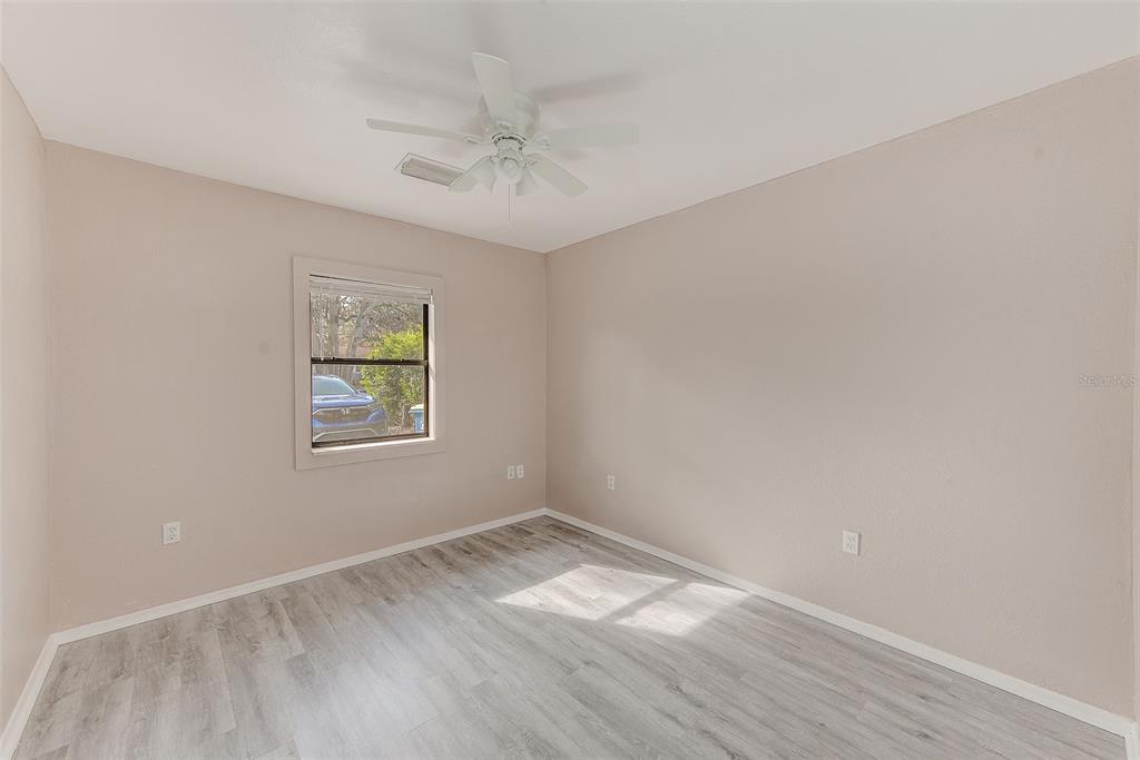1668 Cleveland Street Clearwater, FL 33755 - Photo 14 of 31 an empty room with a window
