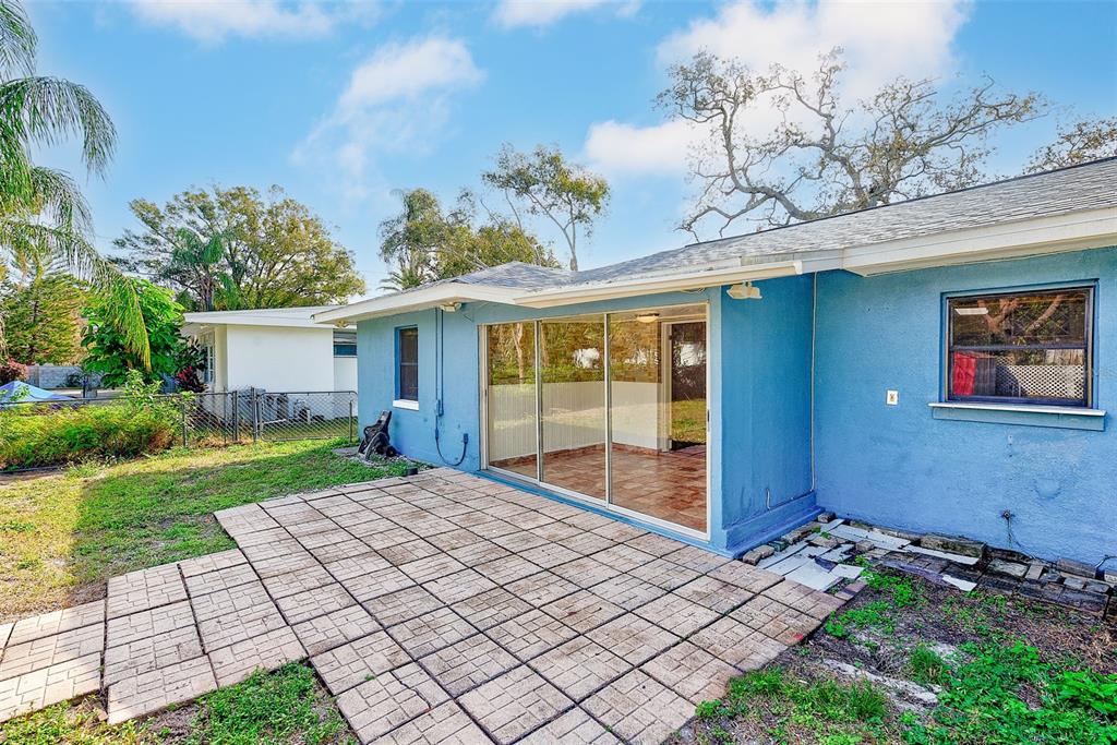 1668 Cleveland Street Clearwater, FL 33755 - Photo 26 of 31 a front view of a house with garden