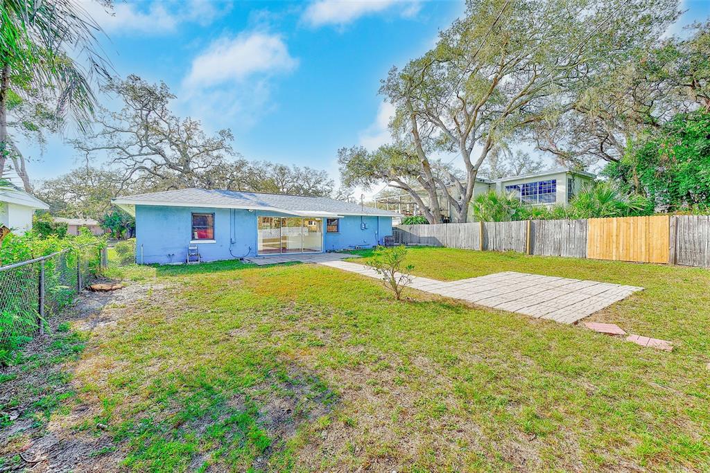 1668 Cleveland Street Clearwater, FL 33755 - Photo 31 of 31 a view of a house with a yard