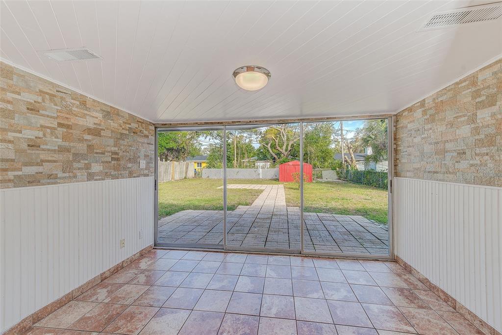 1668 Cleveland Street Clearwater, FL 33755 - Photo 8 of 31 a view of an entryway with a garden