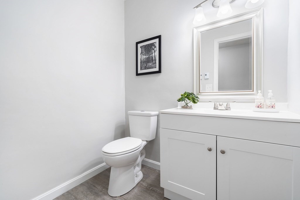35 Old Village Road Sturbridge, MA 01566 - Photo 17 of 39 a bathroom with a sink toilet and a mirror