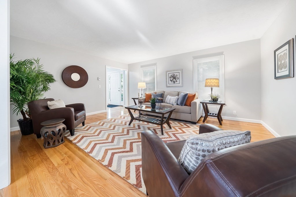 35 Old Village Road Sturbridge, MA 01566 - Photo 20 of 39 a living room with furniture and a rug