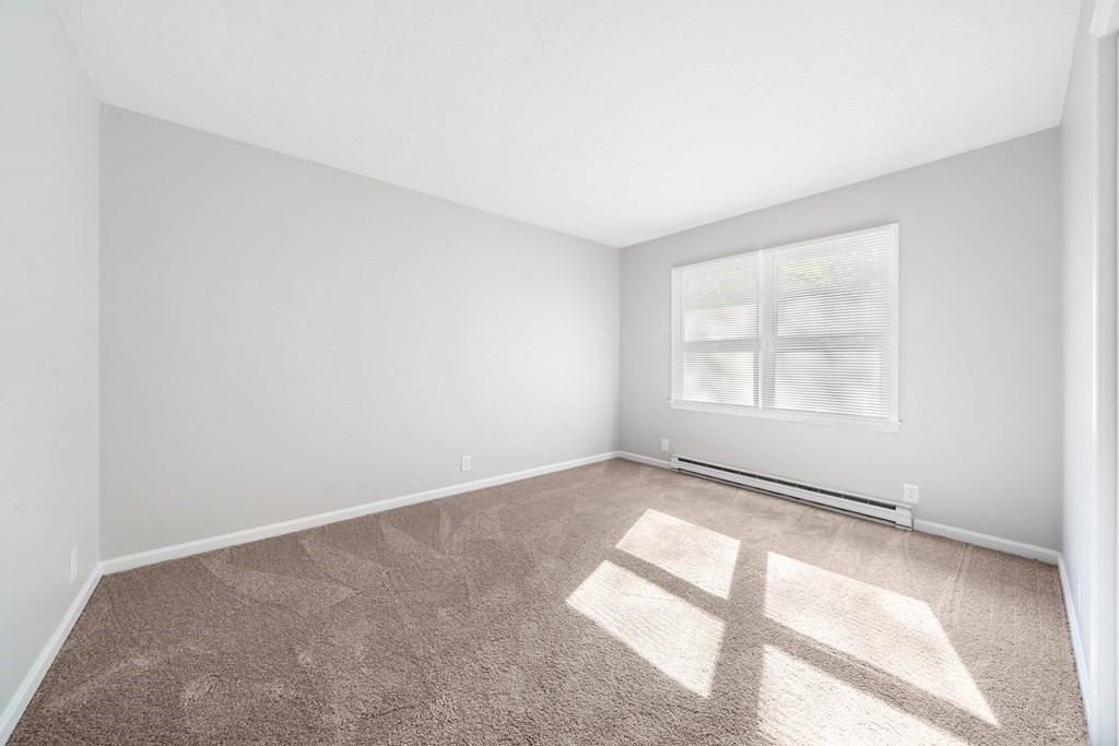 35 Old Village Road Sturbridge, MA 01566 - Photo 23 of 39 an empty room with windows