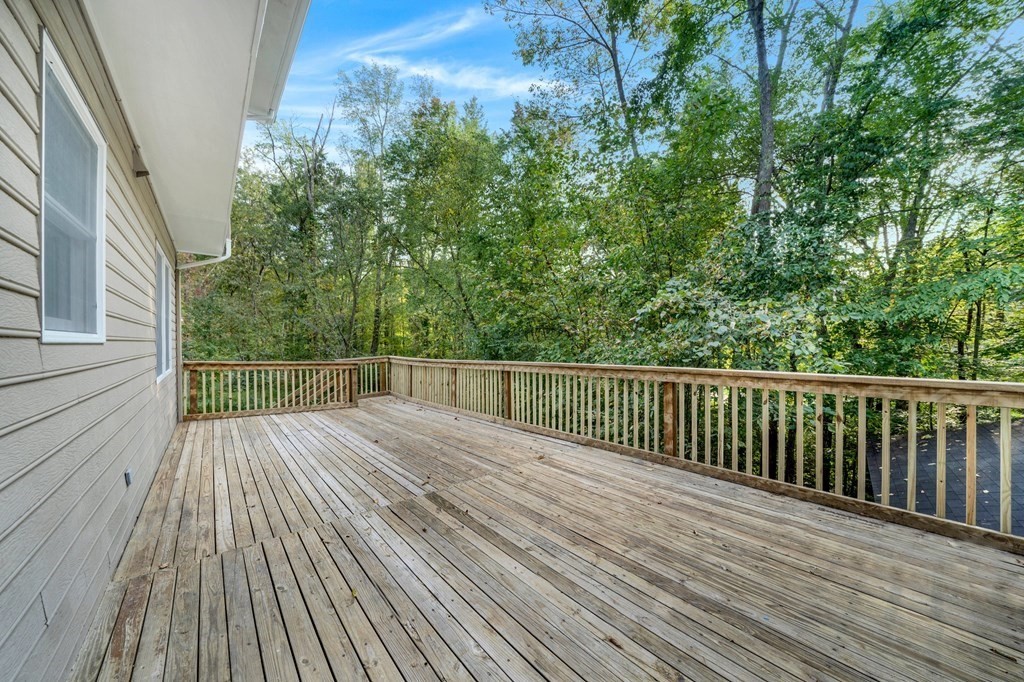 35 Old Village Road Sturbridge, MA 01566 - Photo 32 of 39 a view of deck with wooden floor and fence