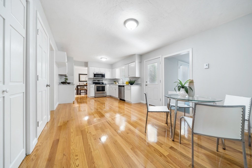 35 Old Village Road Sturbridge, MA 01566 - Photo 8 of 39 a view of kitchen with furniture and wooden floor