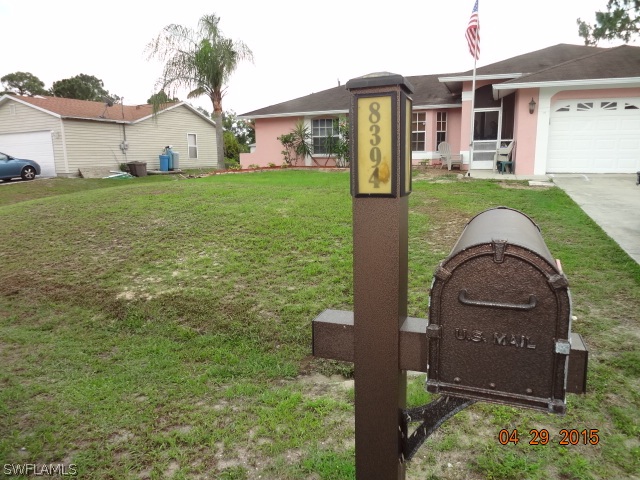 8394 Bamboo Road Fort Myers, FL 33967 - Photo 3 of 25 a house view with a garden space