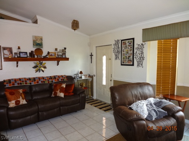 8394 Bamboo Road Fort Myers, FL 33967 - Photo 5 of 25 a living room with furniture and a couch