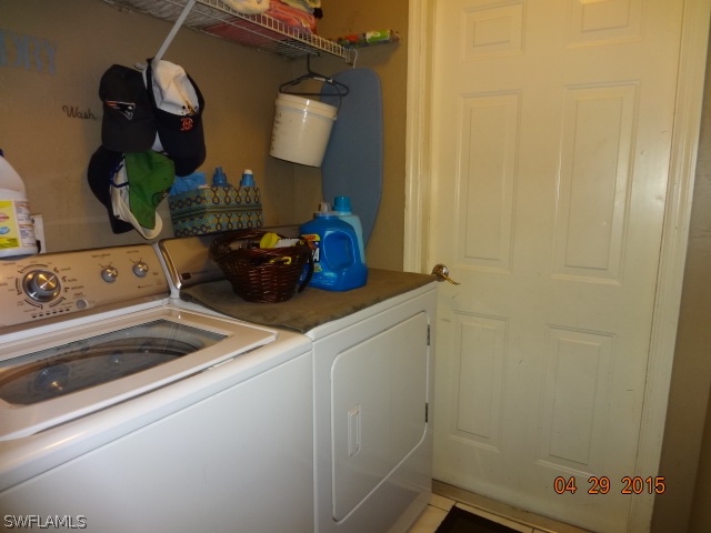 8394 Bamboo Road Fort Myers, FL 33967 - Photo 8 of 25 a bathroom with a sink and a mirror
