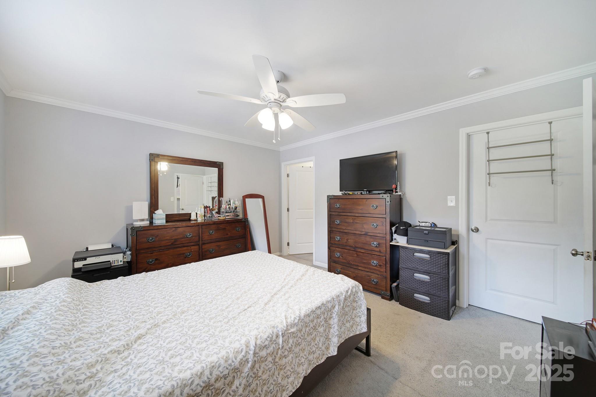 2302 Douglas Road Lancaster, SC 29720 - Photo 15 of 30 a bedroom with a bed and a flat screen tv