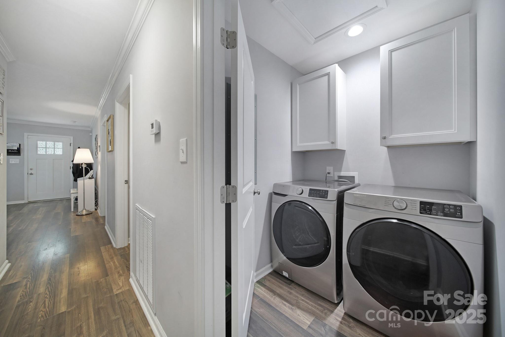 2302 Douglas Road Lancaster, SC 29720 - Photo 22 of 30 a view of a hallway with washer and dryer