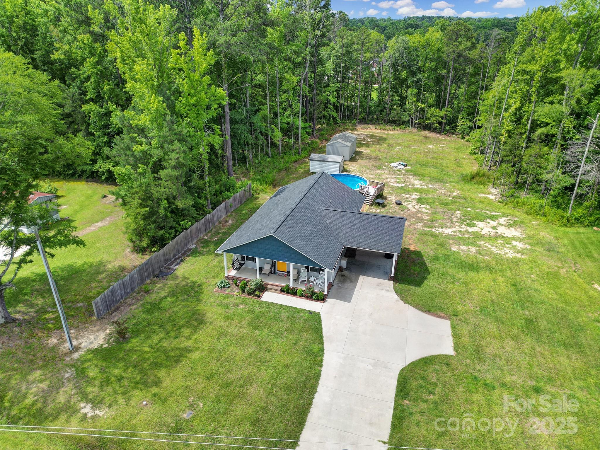 2302 Douglas Road Lancaster, SC 29720 - Photo 5 of 30 a view of a house with a yard