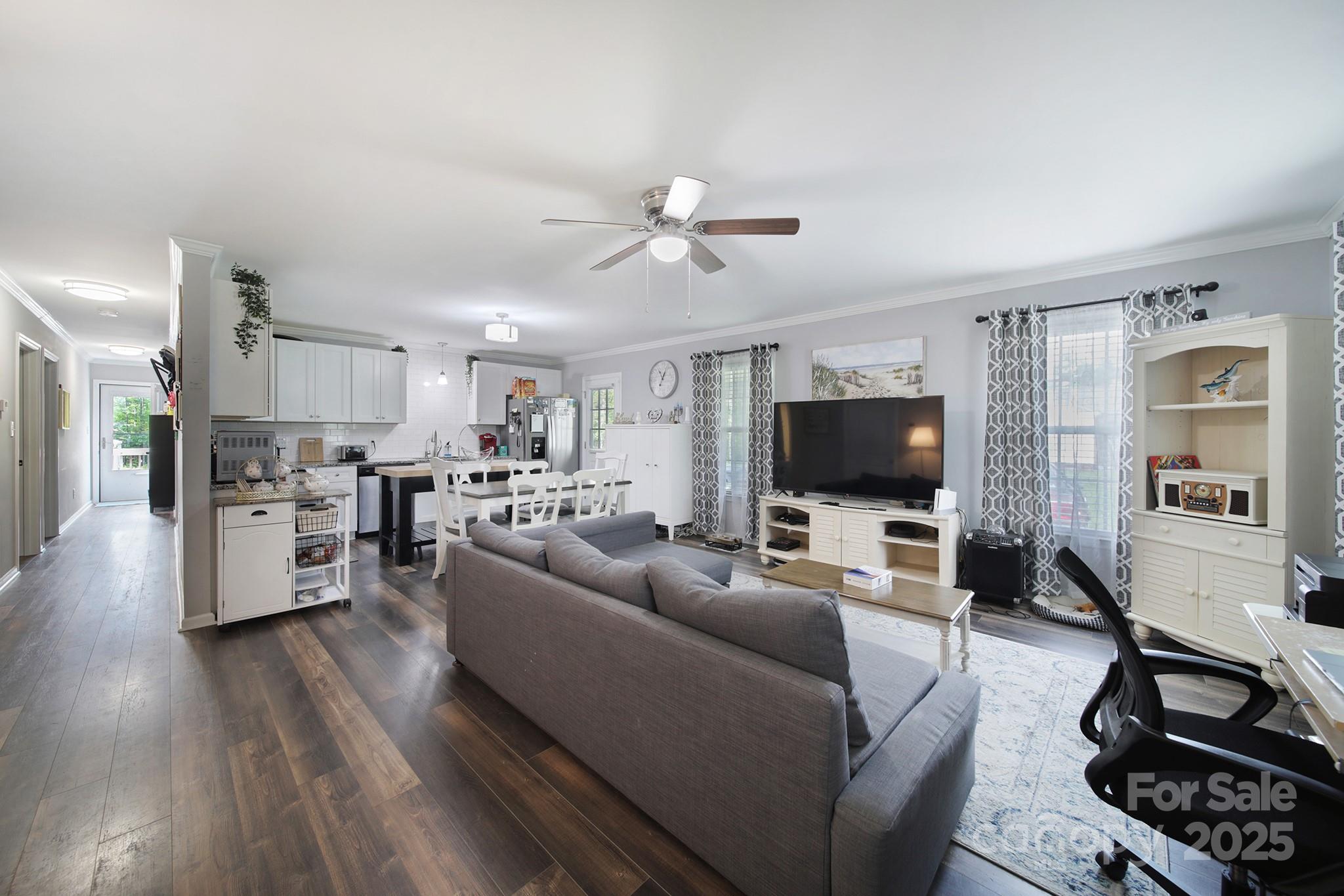2302 Douglas Road Lancaster, SC 29720 - Photo 7 of 30 a living room with furniture and a flat screen tv