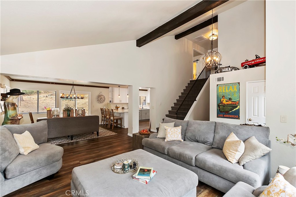 120 Pine Ridge Road Crestline, CA 92325 - Photo 16 of 58 a living room with furniture and a large window