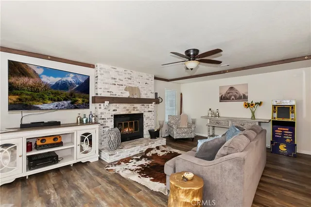 a kitchen with white cabinets and refrigerator