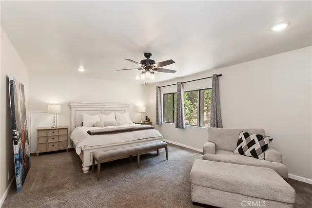 a bathroom with a double vanity sink mirror and shower