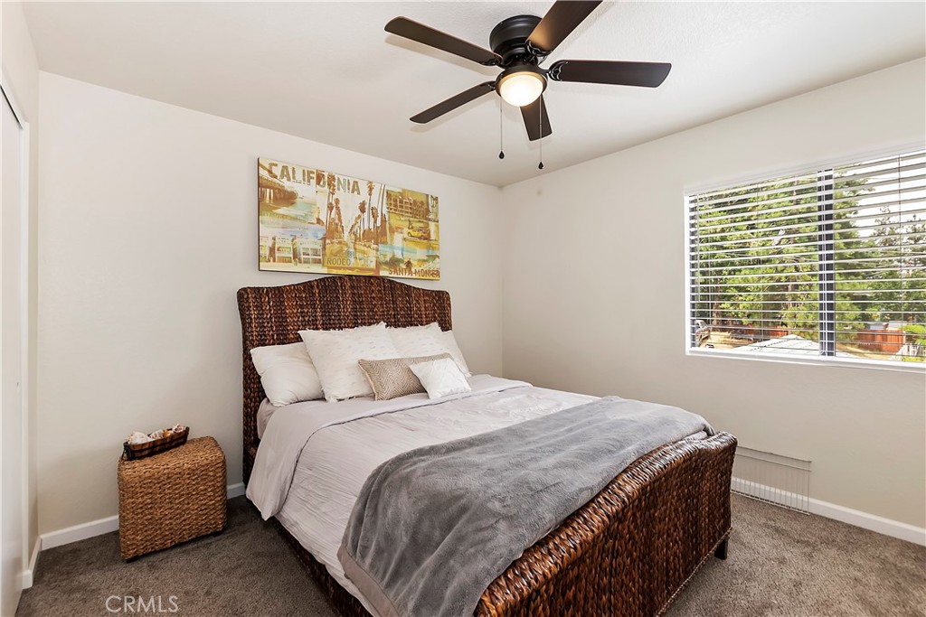 120 Pine Ridge Road Crestline, CA 92325 - Photo 33 of 58 a bedroom with a bed and window