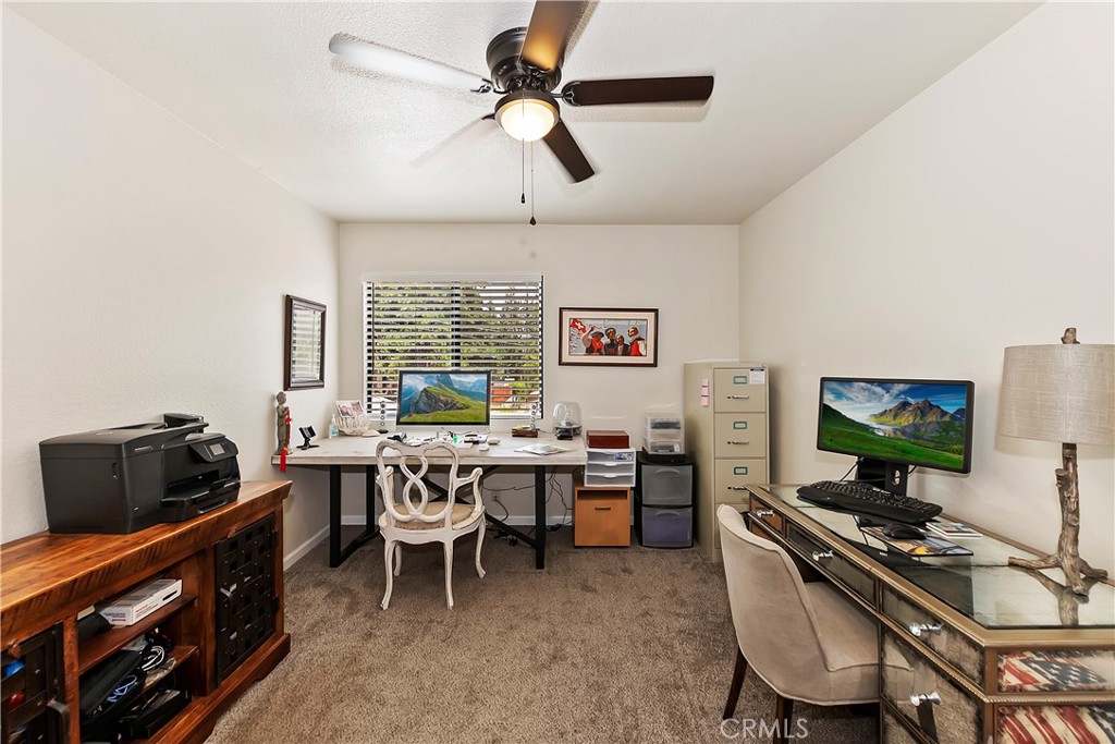 120 Pine Ridge Road Crestline, CA 92325 - Photo 35 of 58 a kitchen with a stove and a table