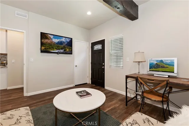 a kitchen with a refrigerator stove and microwave