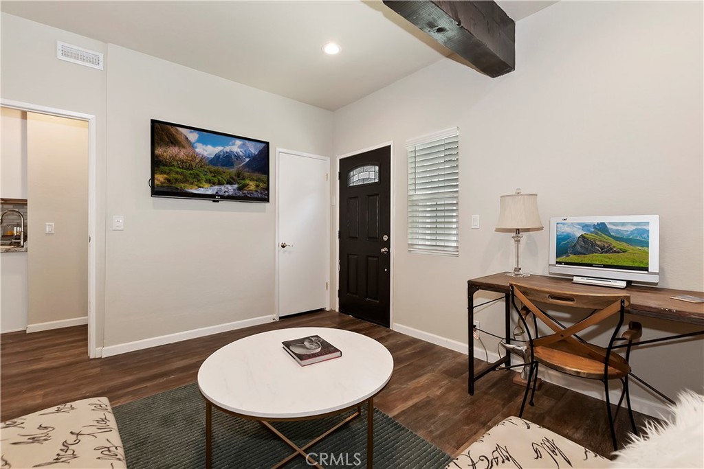 120 Pine Ridge Road Crestline, CA 92325 - Photo 39 of 58 a living room with furniture and a flat screen tv