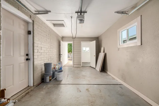 a view of a livingroom with furniture and windows