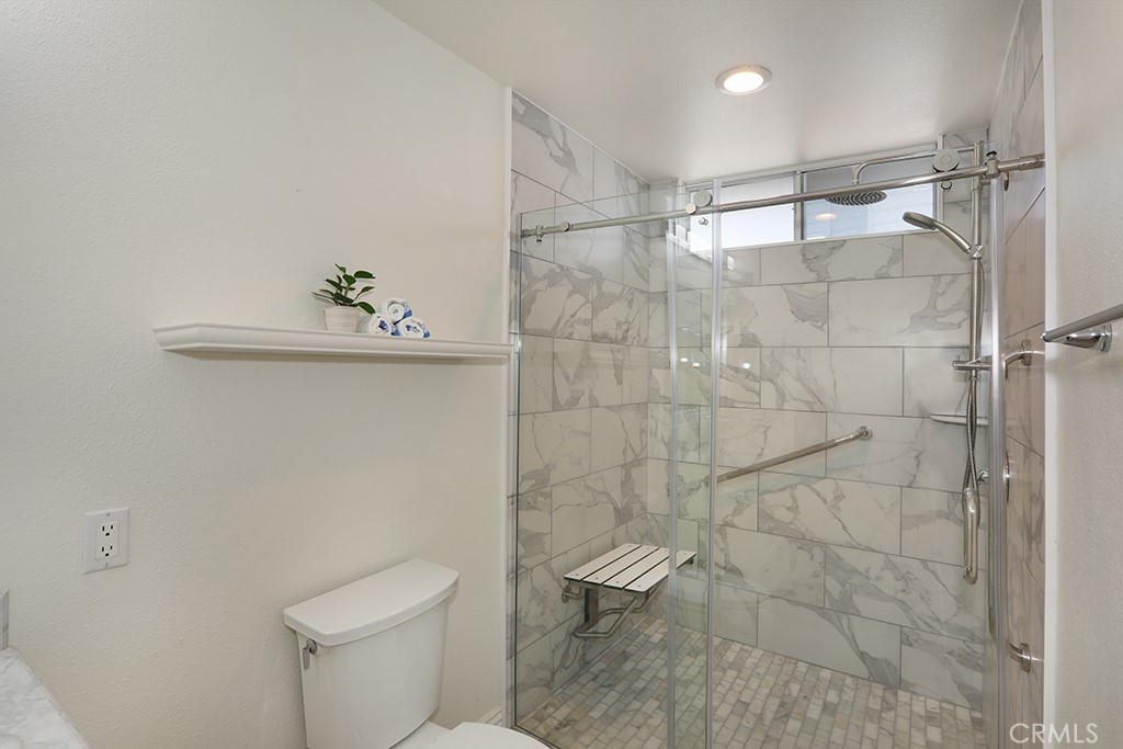 34072 Capistrano By The Sea Dana Point, CA 92629 - Photo 43 of 68 a bathroom with a toilet and a shower