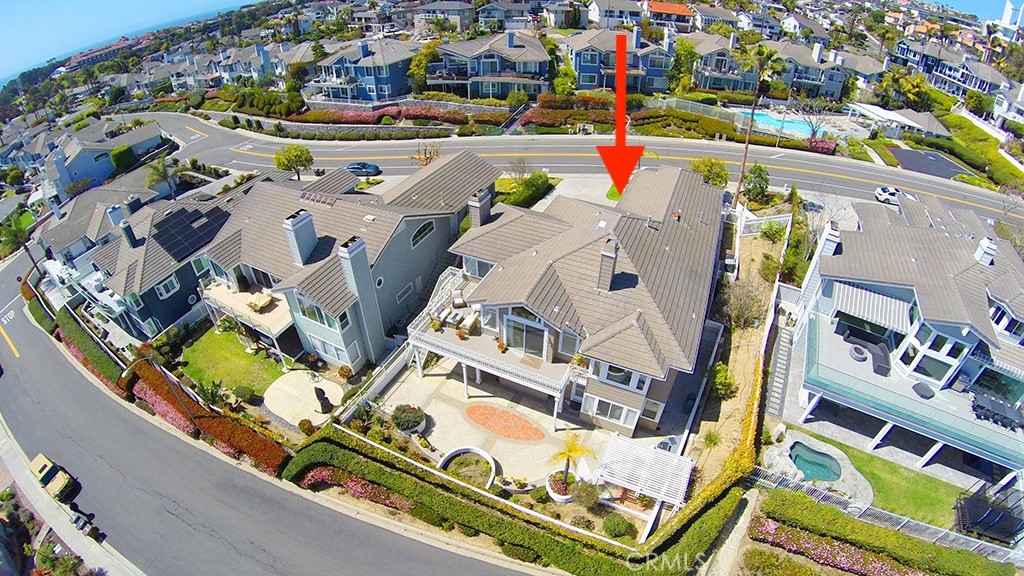 34072 Capistrano By The Sea Dana Point, CA 92629 - Photo 65 of 68 an aerial view of a house with a swimming pool and outdoor seating