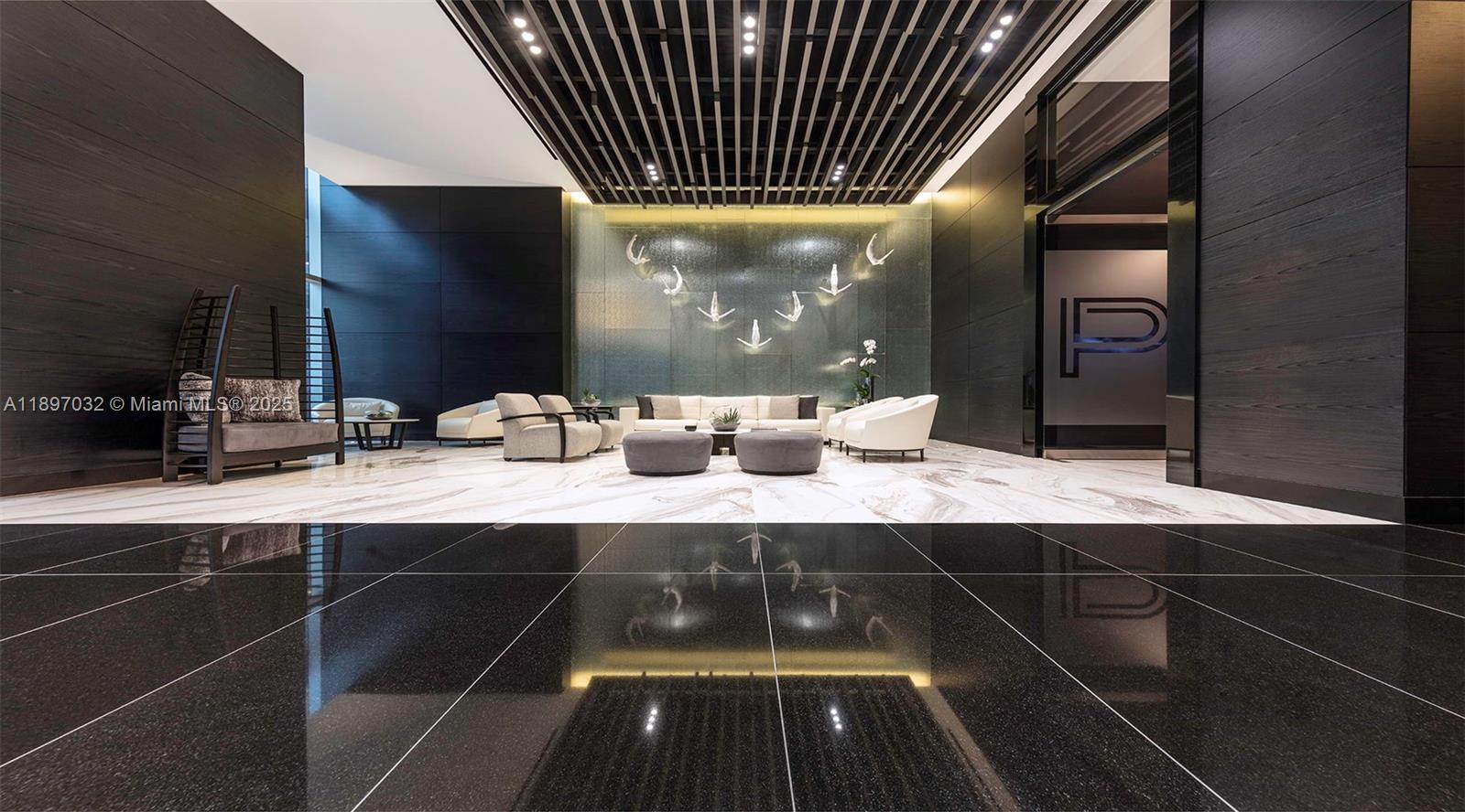 851 Northeast 1st Avenue, Unit 806 Miami, FL 33132 - Photo 40 of 51 a bathroom with a sink and a mirror