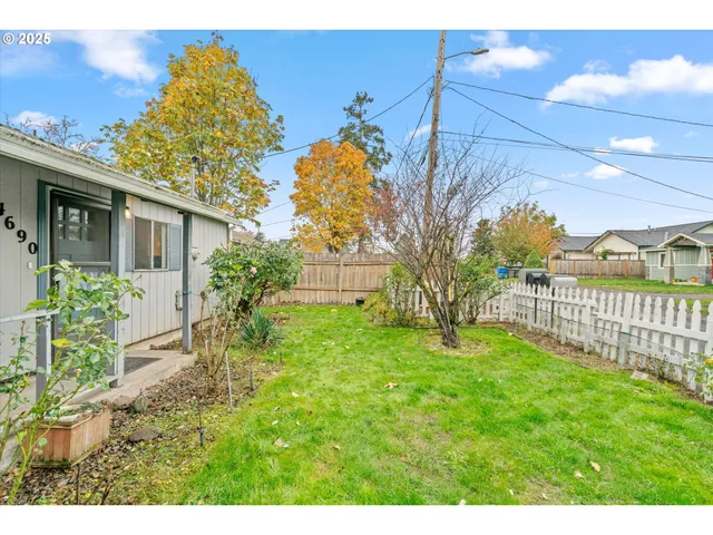 a view of a backyard with a garden