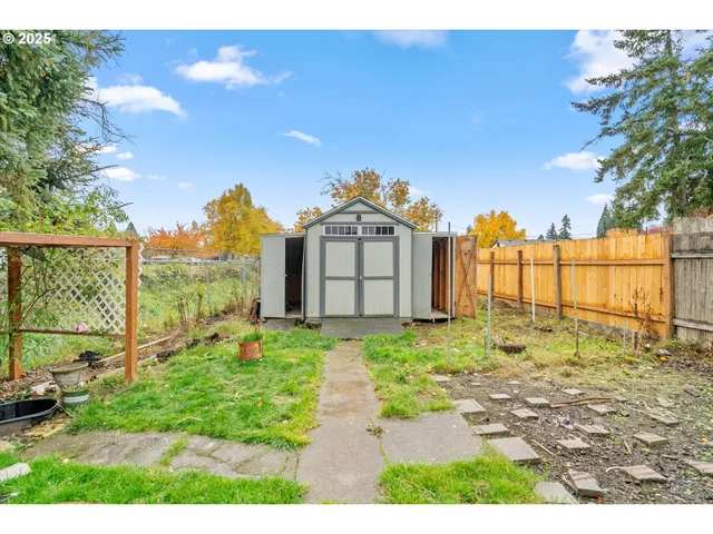 a backyard of a house with lots of green space