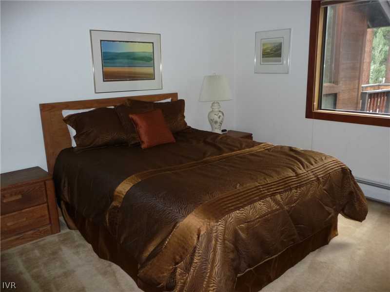 979 Cart Court Incline Village, NV 89451 - Photo 16 of 34 a bed sitting in a bedroom next to a window