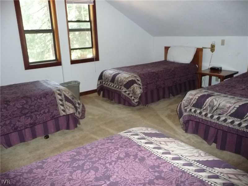 979 Cart Court Incline Village, NV 89451 - Photo 27 of 34 a bedroom with bed and window
