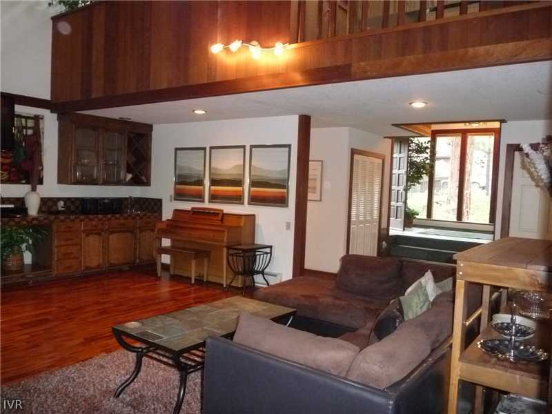 979 Cart Court Incline Village, NV 89451 - Photo 29 of 34 a living room with furniture a fireplace and kitchen view