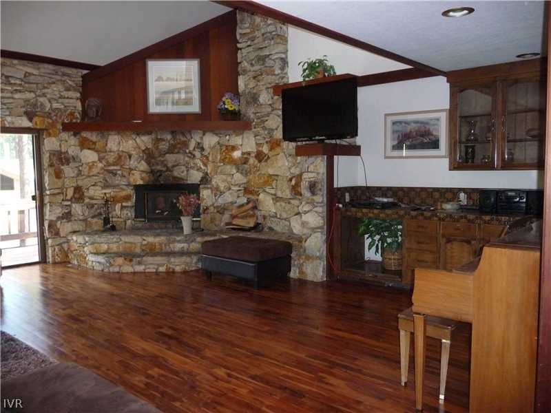 979 Cart Court Incline Village, NV 89451 - Photo 3 of 34 a living room with fireplace furniture and a flat screen tv