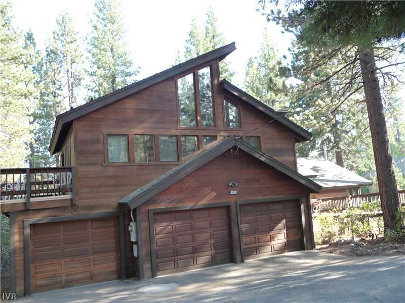 979 Cart Court Incline Village, NV 89451 - Photo 33 of 34 a front view of a house with a yard and garage
