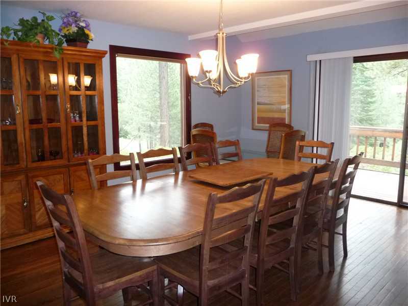979 Cart Court Incline Village, NV 89451 - Photo 6 of 34 a dining room with furniture a chandelier and wooden floor