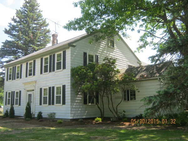 226 West Road Ashby, MA 01431 - Photo 1 of 28 a view of a yard in front of a house with large windows